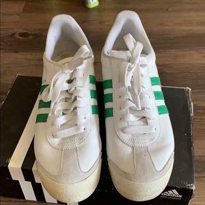 Adidas Samoa sneakers with green stripes